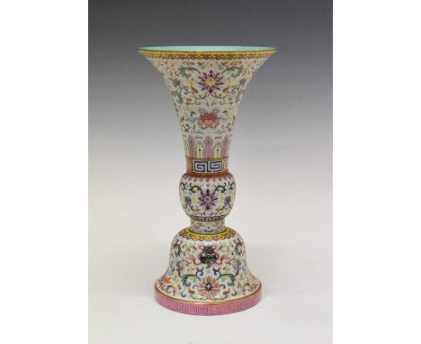 Chinese Canton Famille Rose porcelain Gu ‘Bajixiang’ vase, modelled in two sections after an archaic ritual wine vessel, the 