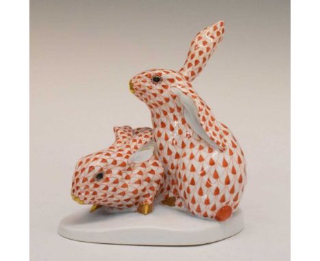 Herend, Hungary - Porcelain model of two rabbits, painted and gilded in iron-red, printed marks, 14.5cm high 