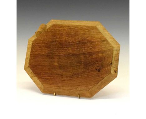 Workshop of Robert 'Mouseman' Thompson, late 20th Century English oak octagonal breadboard or cheese board with adzed surface