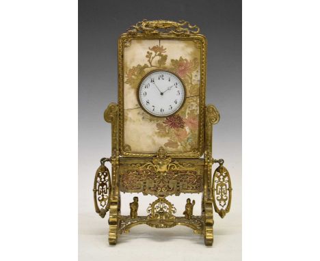 Late 19th Century French brass table and porcelain table clock, in the form of a Chinese table screen, with dragon cresting o