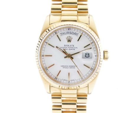 Rolex - Gentleman's 18K Day Date automatic chronometer wristwatch, Ref.18038, having a signed white dial with fluted bezel, g