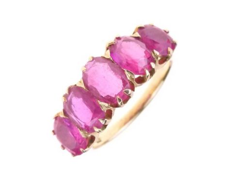 Five-stone ruby ring, the mount stamped '18', size N, 4.5g gross approx