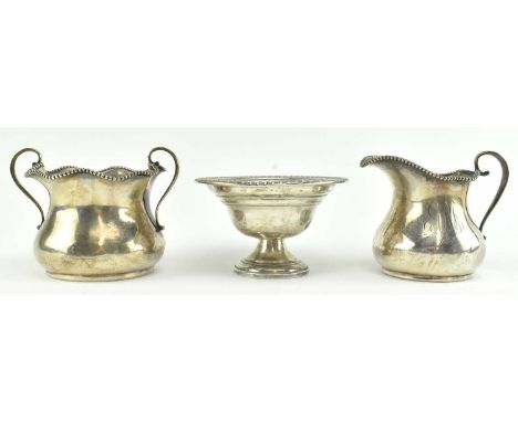 A 19th century American sterling 925 silver creamer and twin handled sugar bowl. Monogram and date 1898 to each. Stamped 925 