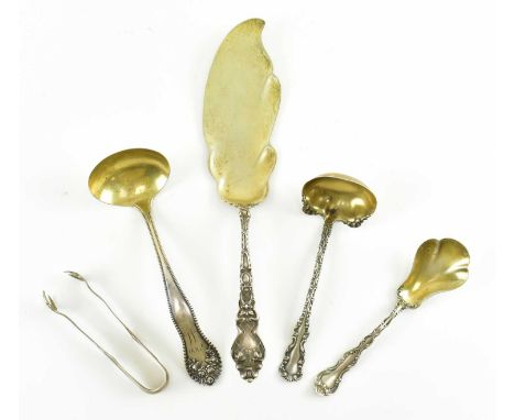A collection of late 19th / early 20th century American silver flatware. To include a pair of Daniel Lowe &amp; Co. sterling 