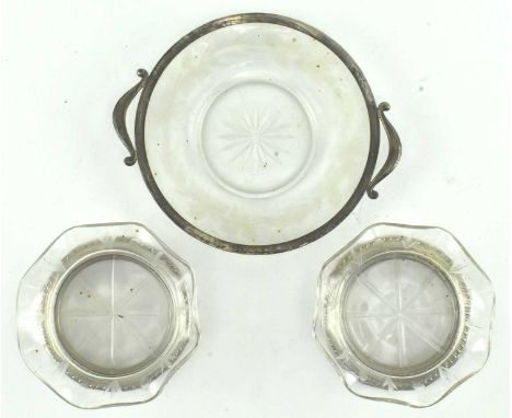 A collection of 20th century American sterling silver counted sacuer and two lobed edge glass bowls crystal glass coasters. E