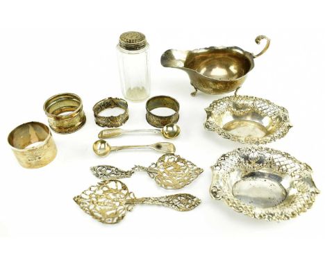 A colection of hallmarked silver pieces. The lot to include a Victorian hallmarked silver gravy boat. Hallmarked year 1904 Lo