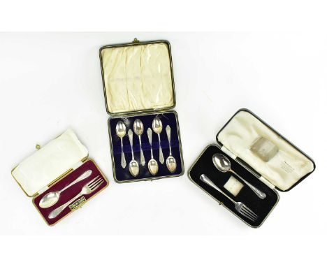 Three cased sets of hallmarked silver flatware. The lot to include a cased of George V set of six hallmarked silver spoons, h
