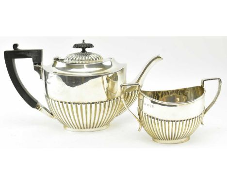 A George V Art Deco Hallmarked silver coffee pot and two-handled sugar bowl, both hallmarked to 1929, London. Sponsor's mark 