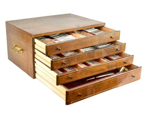 Saint Medard - A 20th century silver-plated four tier cutlery canteen for twelve, comprising table forks, table knives, table