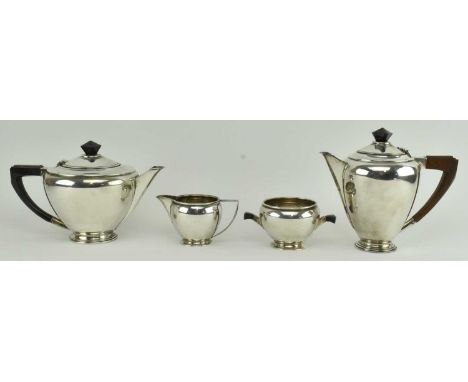 A hallmarked tea and coffee set. Including sugar bowl and creamer. The lot to include a George V hallmarked silver teapot, a 