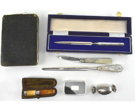 A collection of seven hallmarked silver pieces. The lot to include a Victorian leather wallet with corner silver mounts, hall
