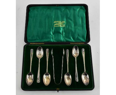 A cased Victorian set of six hallmarked silver teaspoons complete with matching sugar tongs and set within a presentation cas