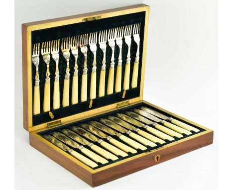 A Geoge V hallmarked silver cased set of twelve fish knives and forks. Hallmarked year 1923 Sheffield, sponsors mark for Will