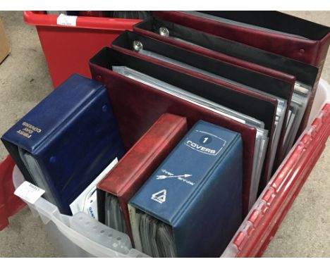 Three boxes containing albums of first day covers (a lot)