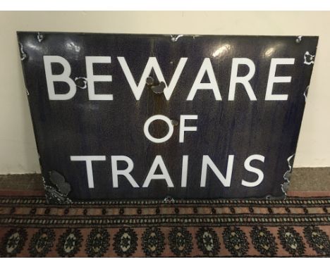 A blue enamel Railway sign, Beware of Trains .68 x 46 cm .