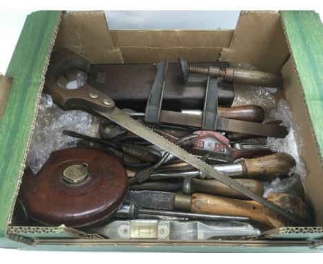 A box of vintage tools.