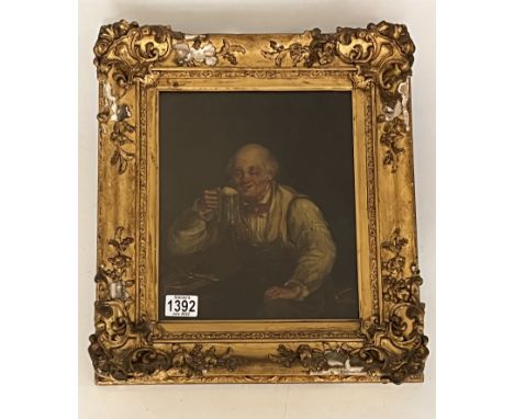 An early Dutch gilt framed painting on board of a man with a tankard and clay pipe. 44 x 39cm