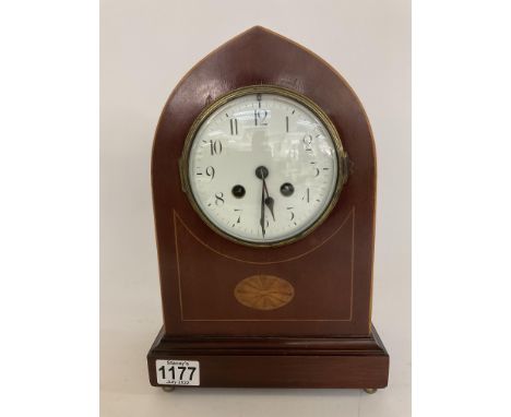 An Edwardian inlaid arch topped mantle clock, 31cm, Key and pendulum.