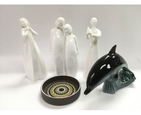 Three Royal Doulton blanc de chine figures, a Hornsea ashtray and a Poole dolphin (5).