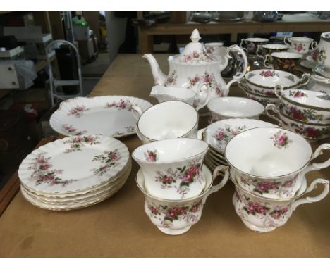 A Royal Albert tea set in Lavender Rose pattern, teapot of second quality.