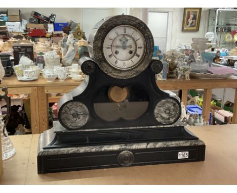 A large impressive black slate and Italian marble mantle clock with visible escapement, 52 x 60cm.