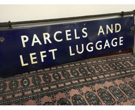 A large blue enamel double sided Railway sign parcels and left Luggage 120 cm x 30 cm