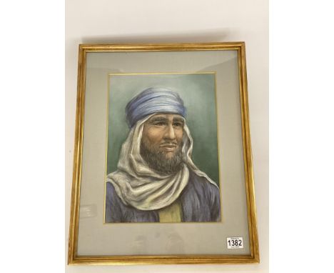 A large gilt framed pastel portrait of an Arab. 46 x 58cm, signed and dated 1963.