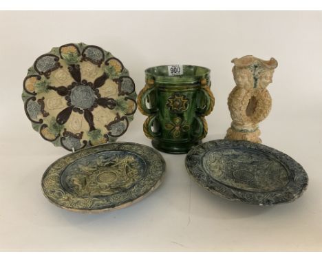 A group of Castle Hedingham pottery, by Edward Bingham. To include a green gazed loving cup, 2 classical themed dishes, A Bow