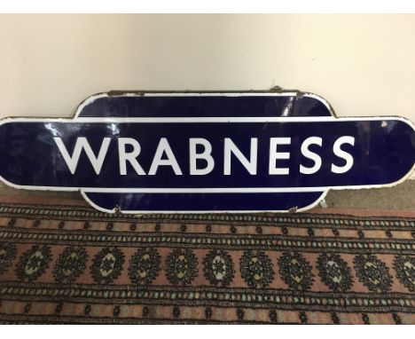 A blue enamel railway sign Wrabness 91 cm by 26 cm .