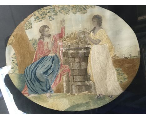 A framed classical tapestry and floral cushion .