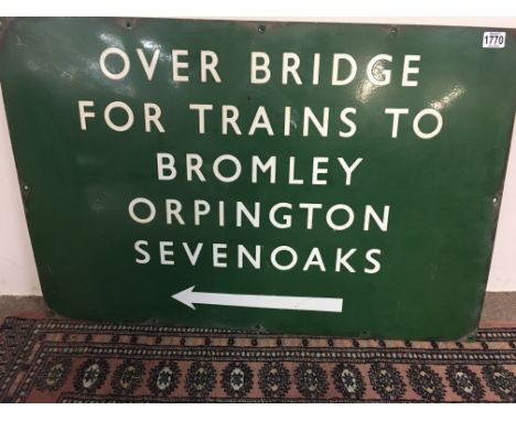 A large enamel green railway sign over the Bridge for trains to Bromley Orpington Sevenoaks.92 cm by 62 cm .