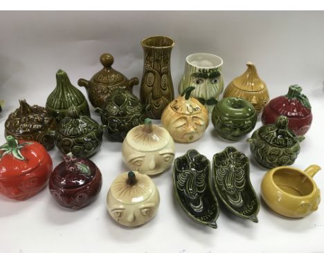 A collection of vintage ceramic food storage jars.