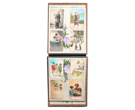 Postcards. Approx. 119, early 20th century, collected in two Japanese black lacquer and abalone marquetry albums, each backed