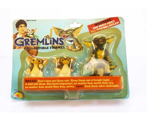 Vintage Gremlins Figures, 1984 Set of three figures from the Gremlins Film by LJN comprising Gizmo, Stripe and Gremlin - seal