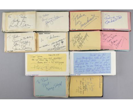 Autographs - 200+ signed pages in autograph albums Film & TV including Pierce Brosnan, Colin Firth, Ken Dodd, Tsai Chin, Robe
