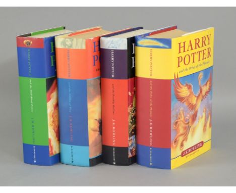 Harry Potter - Four hardback first edition books.   