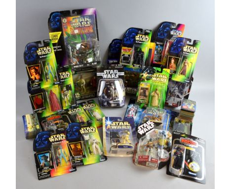 Collection of Star Wars toys and trading cards including The Power of the Force, Kenner, Attack of the clones, The Saga Colle