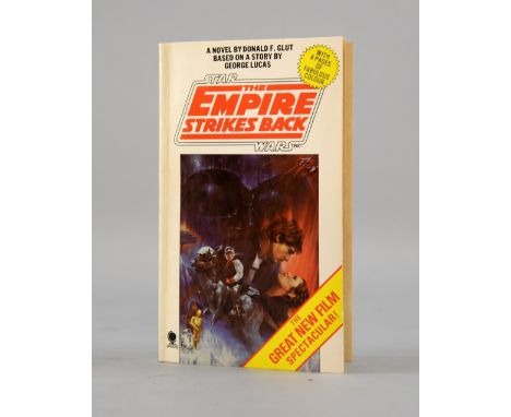 Star Wars The Empire Strikes Back - First Edition paperback book (1980) signed to the inside by Mark Hamill, Carrie Fisher, H