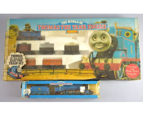 Hornby The World of Thomas to include Thomas, Annie and Clarabel, brake van, closed van and open wagon, incomplete, boxed and