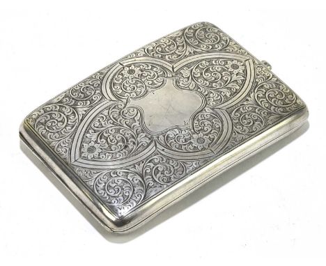 A George V hallmarked silver cigarette case, with engraved floral detailing and of curved form, Birmingham 1922, length 11.5c