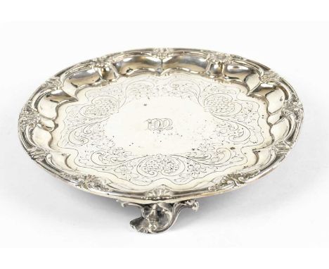 CHARLES RILEY &amp; GEORGE STORER; a William IV hallmarked silver salver of circular form, with a cast border of open shall d