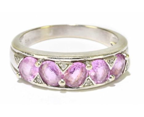 A 9ct white gold pink sapphire and diamond ring, size Q 1/2, approx. 4g. 