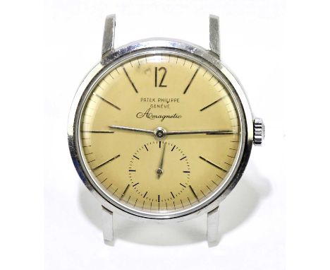 PATEK PHILIPPE; an exceptionally rare gentleman's stainless steel anti-magnetic wristwatch, 1958-1960, the dial set with appl