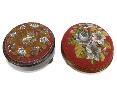 Two Victorian circular foot stools, each decorated with beadwork and tapestry floral tops.