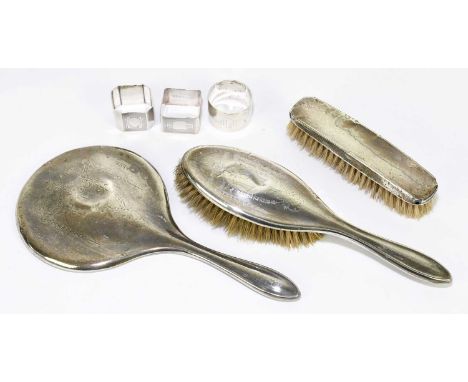 WILLIAM AITKEN; a George V hallmarked silver two piece dressing table set comprising hand mirror and hair brush, with chased 