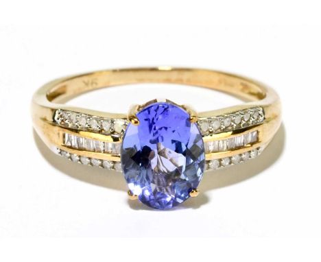 A 9ct yellow gold tanzanite and diamond ring, size R, approx. 2.88g. 