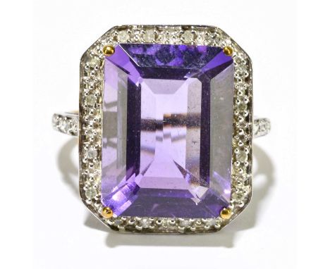 A 9ct yellow gold ring set with large emerald cut amethyst, size N 1/2, approx. 4.78g. 