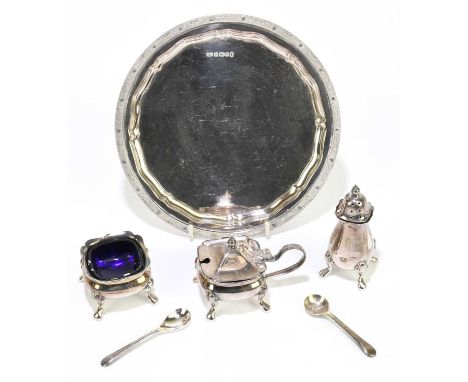 F. DRURY LTD; an Elizabeth II hallmarked silver waiter with cast rim of Celtic knot style motifs, Sheffield 1977, with a hall