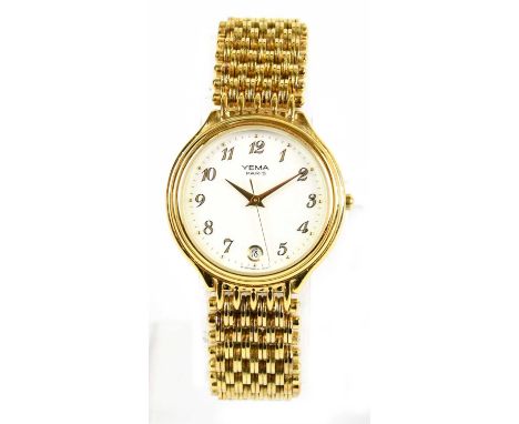 YEMA; a gold tone vintage quartz watch with bracelet strap, white ceramic face and spare chain and battery in original case.C