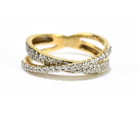 A 9ct yellow gold diamond set crossover ring, size L 1/2, approx. 3.1g.